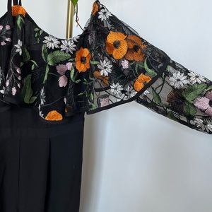 Halter wide leg jumpsuit w/ floral detail